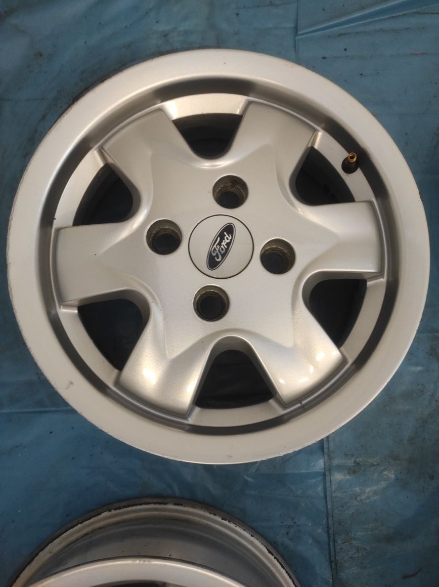 319 Felgi aluminiowe ORYGINAŁ FORD R 14 4x108 otwór 63,3 mm