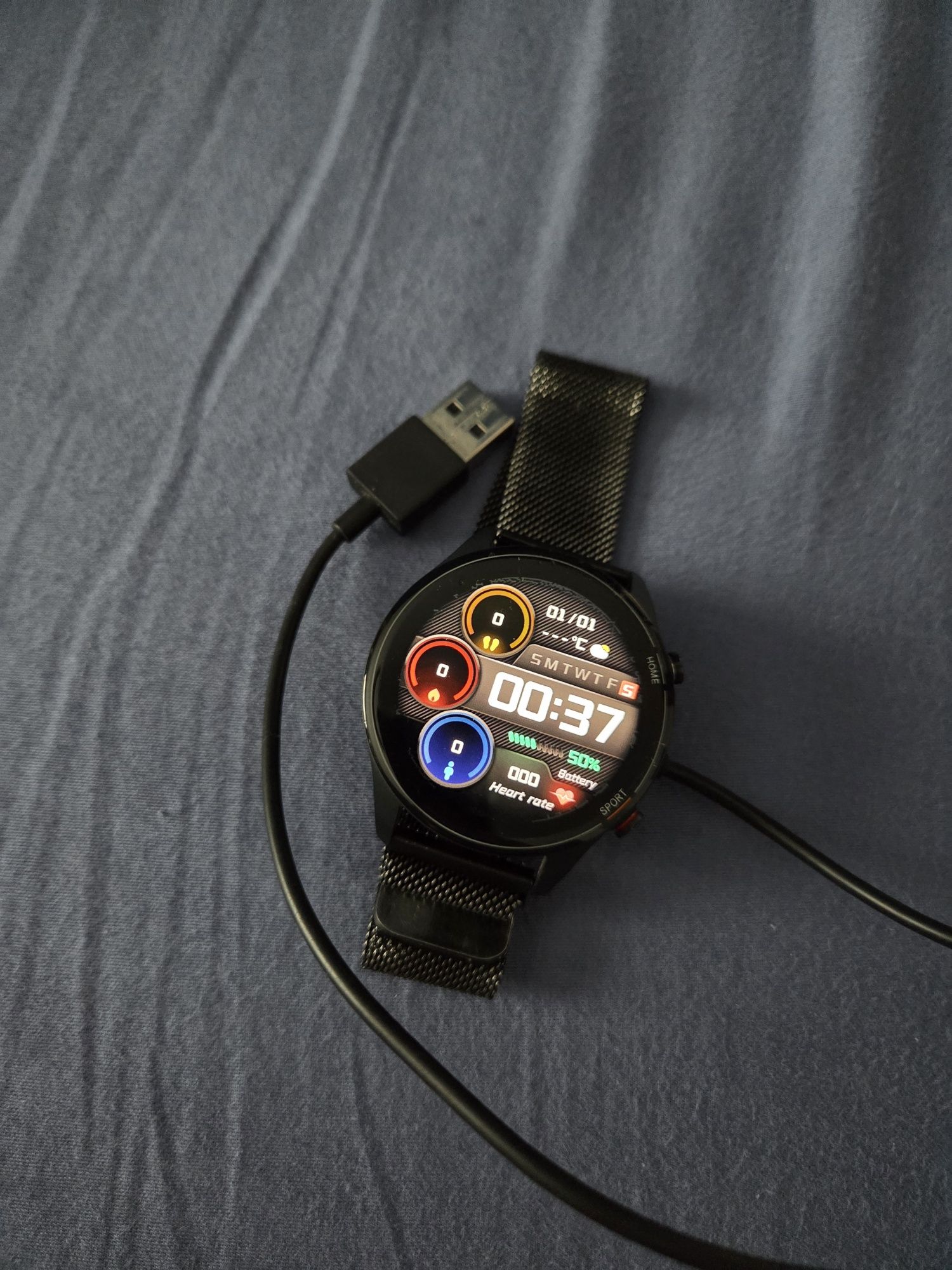 Smartwatch Xiaomi Mi używany z kablem ładującym