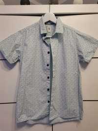 Koszula chłopięca na krótki rękaw niebieska we wzorek 152