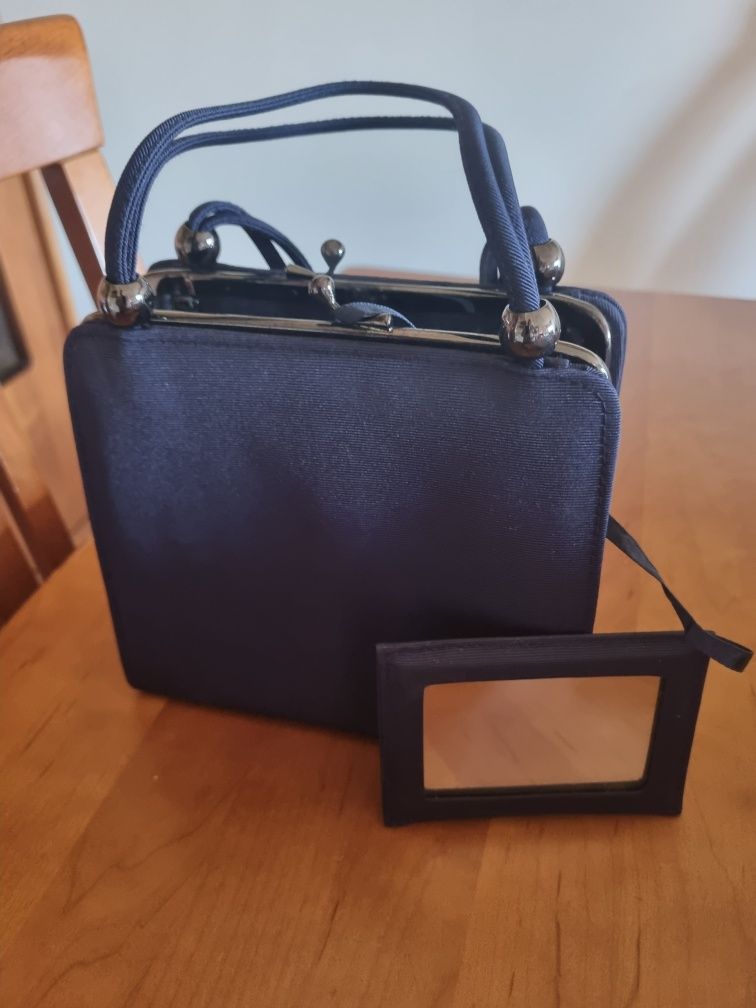 Pochette com espelho