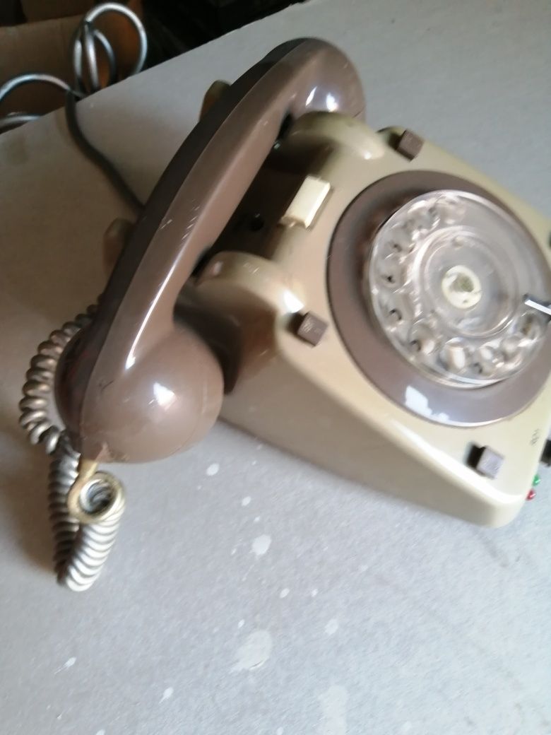 Vendo  telefone antigo bonito bom estado