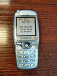 Stary Telefon komórkowy Alcatel OT 735 + ładowarka