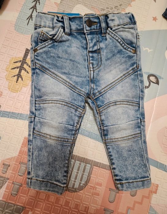 Nowe jeansy dziecięce 74