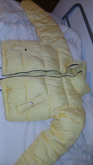 Blusão penas amarelo tamanho