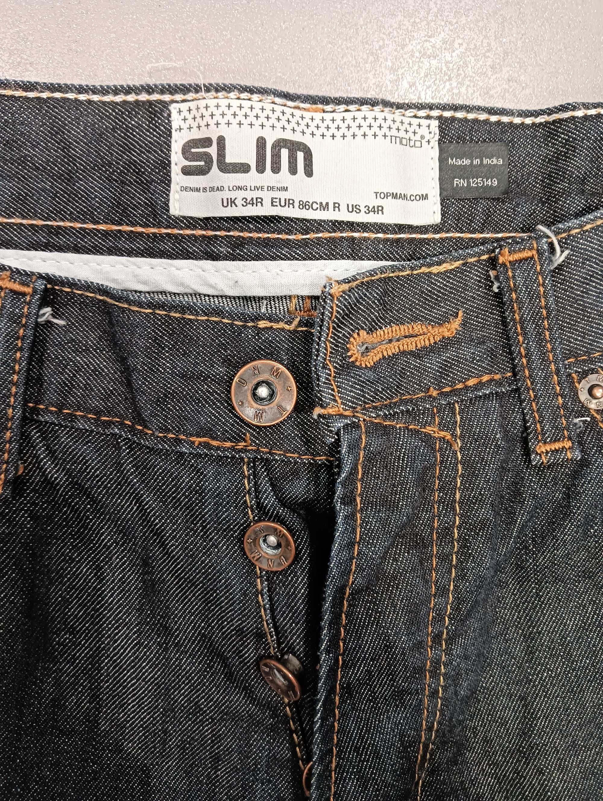 Męskie ciemne granatowe spodnie jeansowe Topman 86 cm nowe