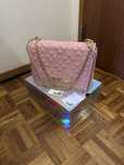 Mala rosa Guess tiracolo e ombro