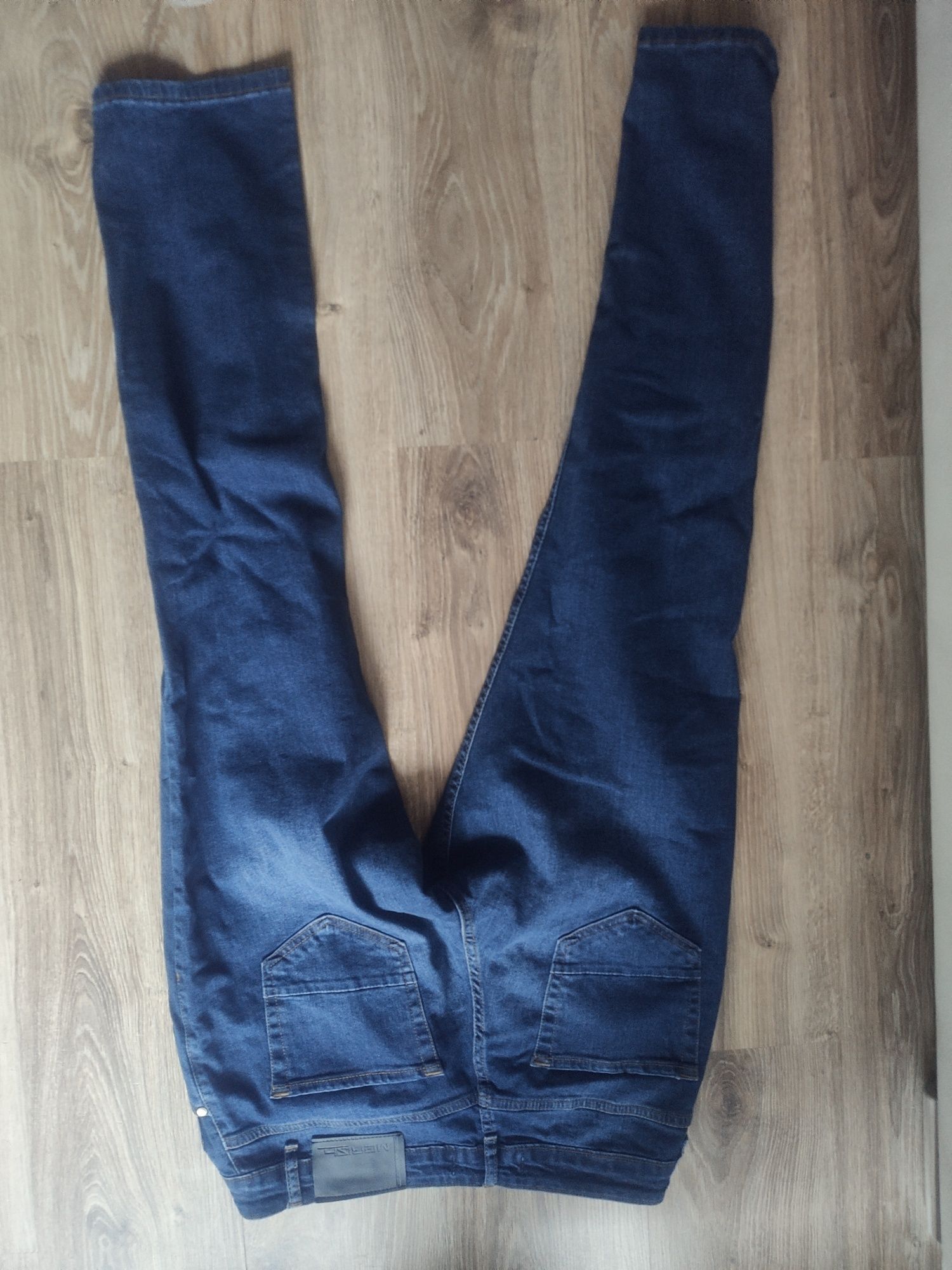 Nowe męskie spodnie jeansy MERISH r. XL wyprzedaż