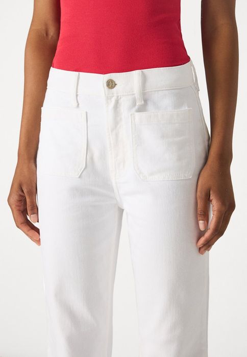 Jeansy Bootcut mleczne Gap 27