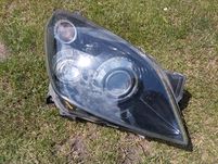 Lampa Opel Astra H III prawy przód Bi-Xenon skrętny kompletna