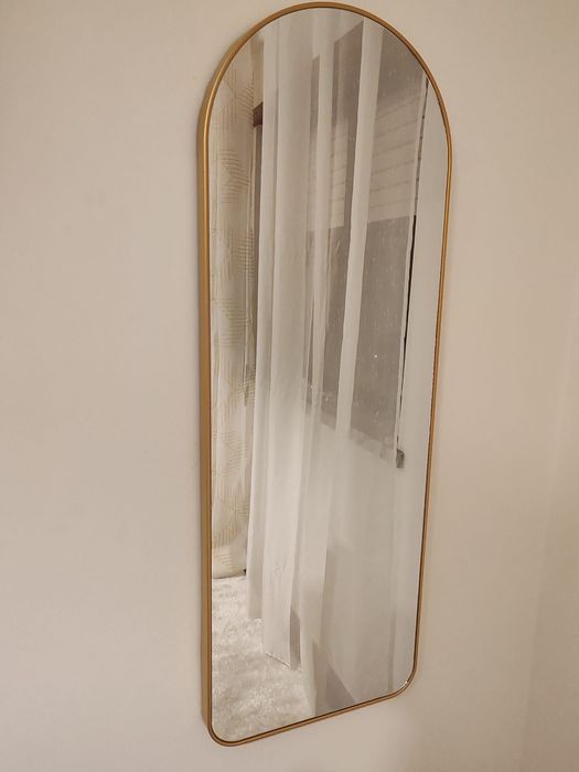 Espelho de parede dourado