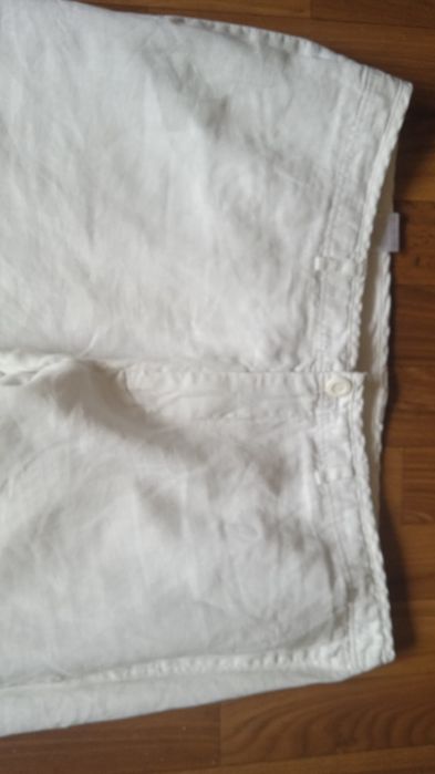 Білі широкі льняні брюки. we