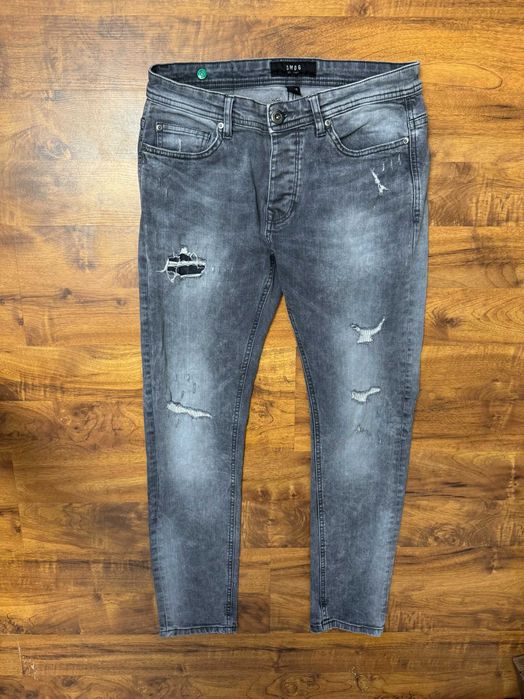Szare spodnie jeansowe jeansy z dziurami rozdarciami Smog W30 L30 S M