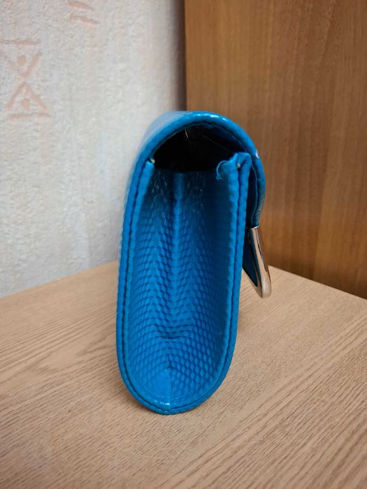 Сумка-клатч бирюзового цвета