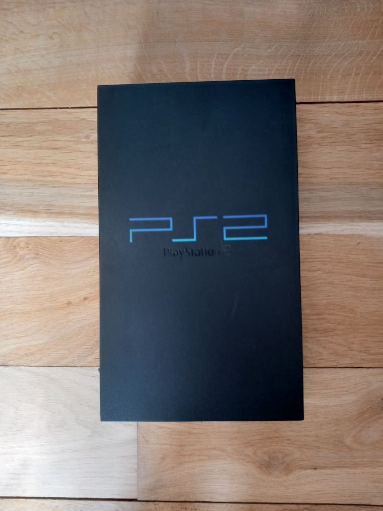 Playstation 2 com 12 jogos + comando +cartão de memória + cabos.