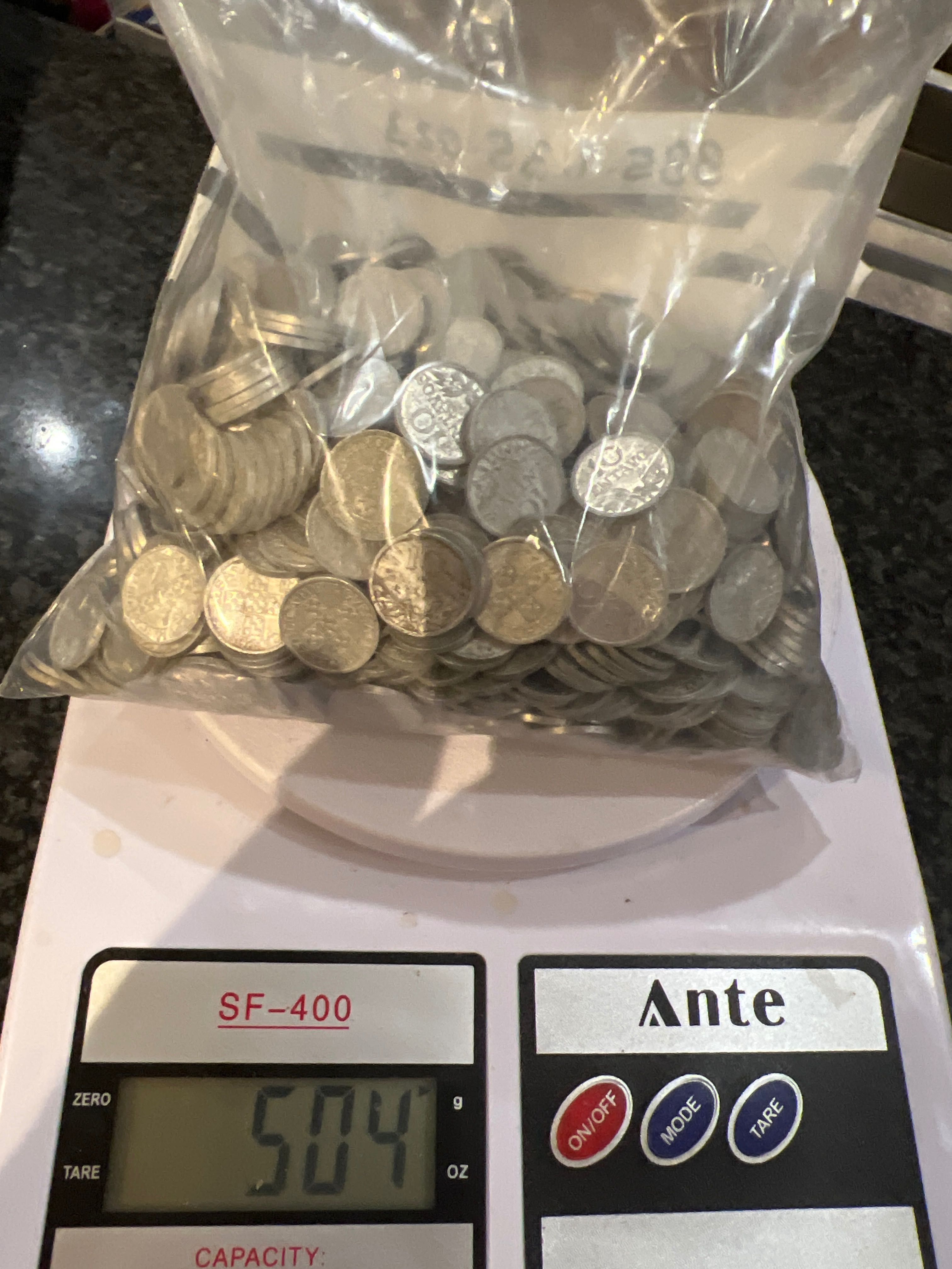 Moedas de tostão alumínio