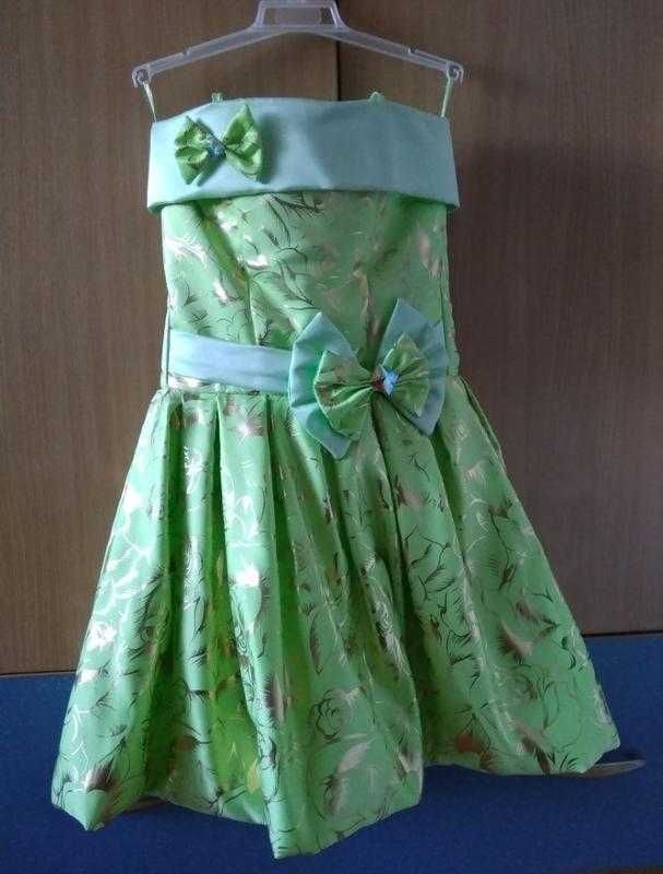 Дитяча ніжно-салатова сукня сонце-кльош