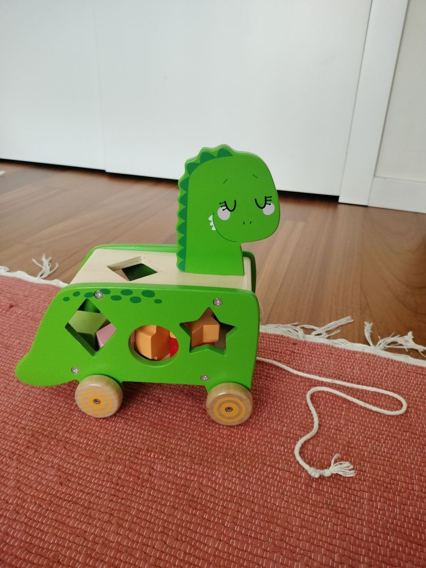 Carrinho dinossauro com peças puzzle de encaixe • brinquedo de madeir