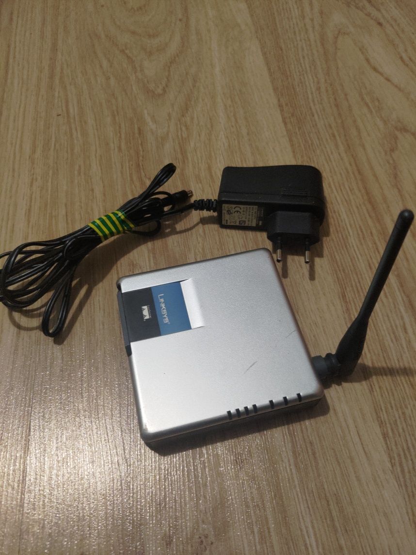 Router Linksys + zasilacz