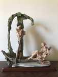 Estatueta em Marfinite