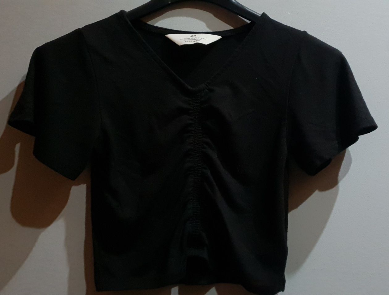 Top czarny H&M 134/140 cm bluzka flamingi
