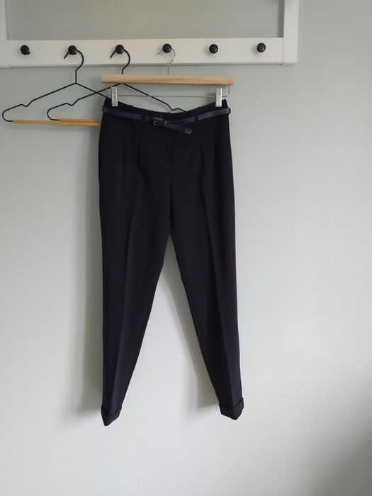 Damskie czarne, grubsze, jesienno zimowe chinosy z paskiem Next