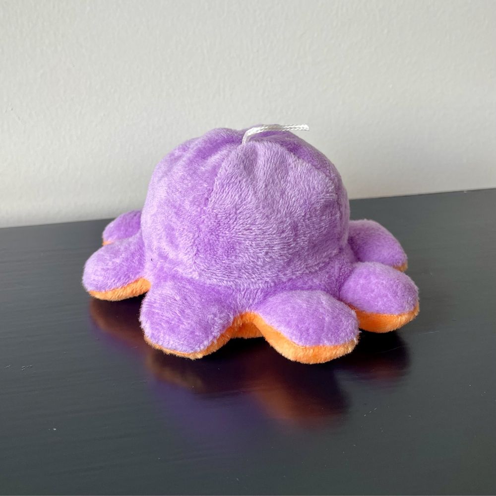 Pequeno peluche reversível de polvo