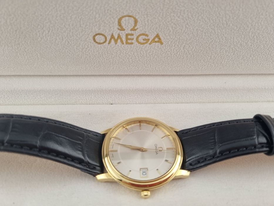 Золотые часы Omega