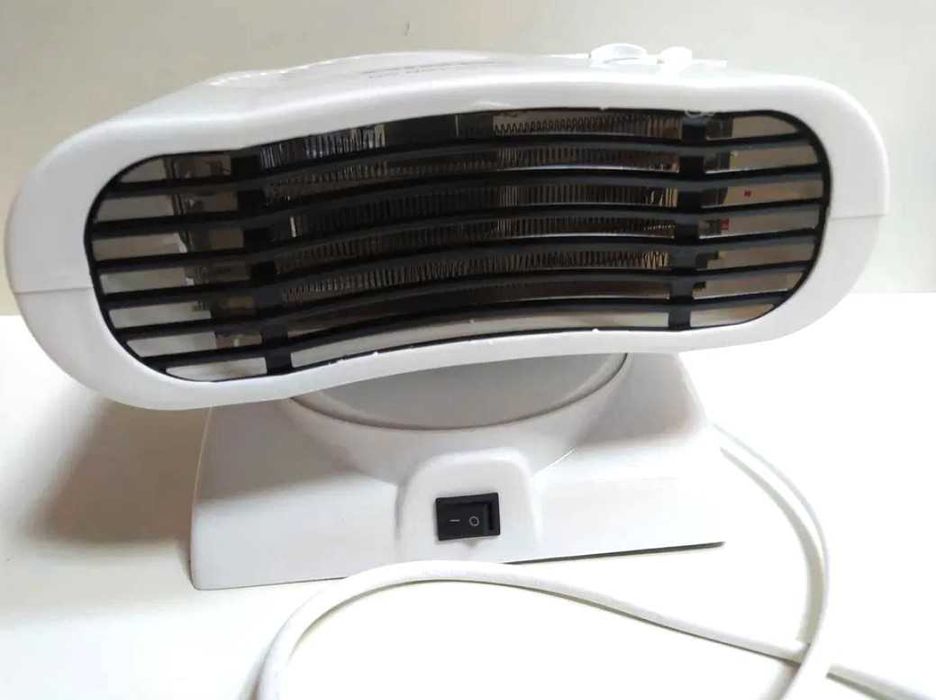 GRZEJNIK ELEKTRYCZNY farelka piecyk 2000W obrotowy dwa tryby mocy
