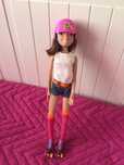 Boneca com patins