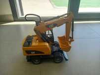 Máquina escavadora Cat