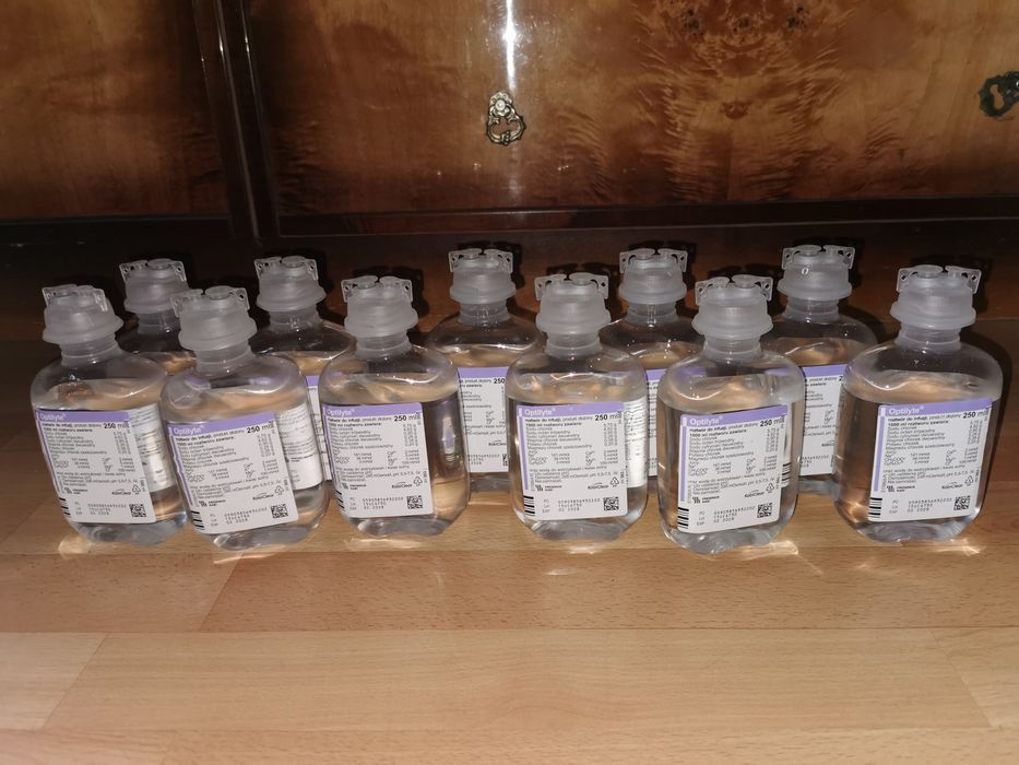 11 sztuk butelek po 250ml  płynu Optylite