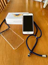 iPhone 6S com acessórios, dourado e branco