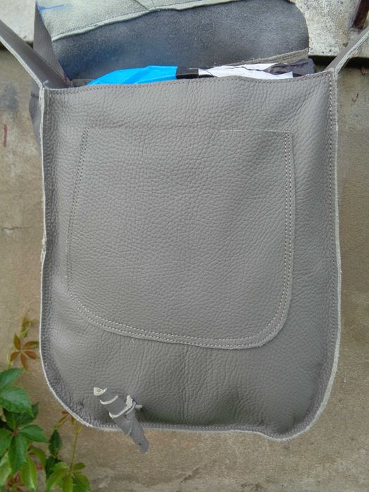 Artystyczna torebka skórzana z głową kobiety. Handmade