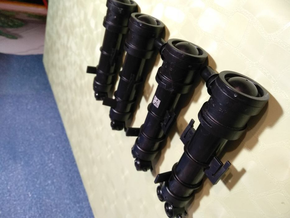 Форсунка омывателя фар