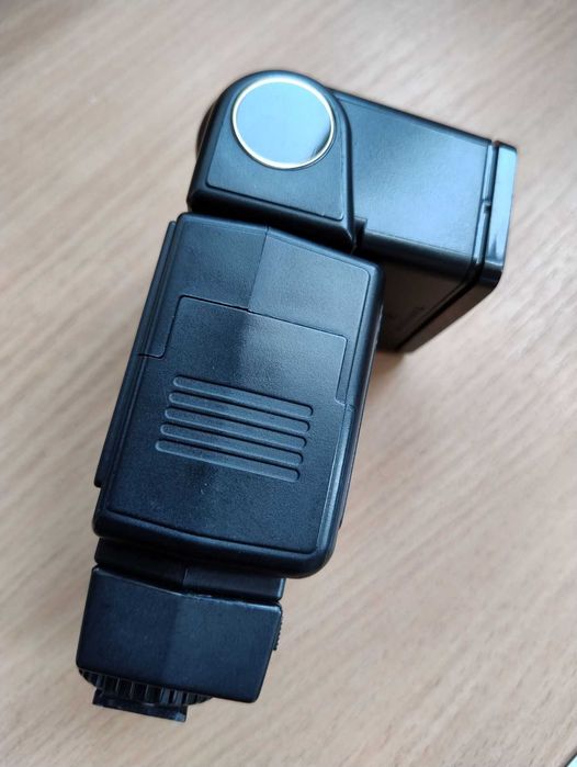 Вспышка Sunpak Auto 444D поворотная Minolta Leica Canon Nikon Fujifilm