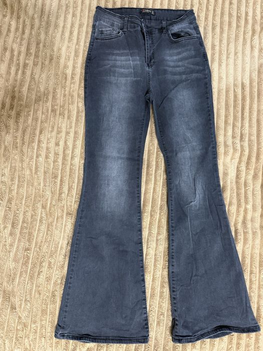 Джинси кльош чорні М 38