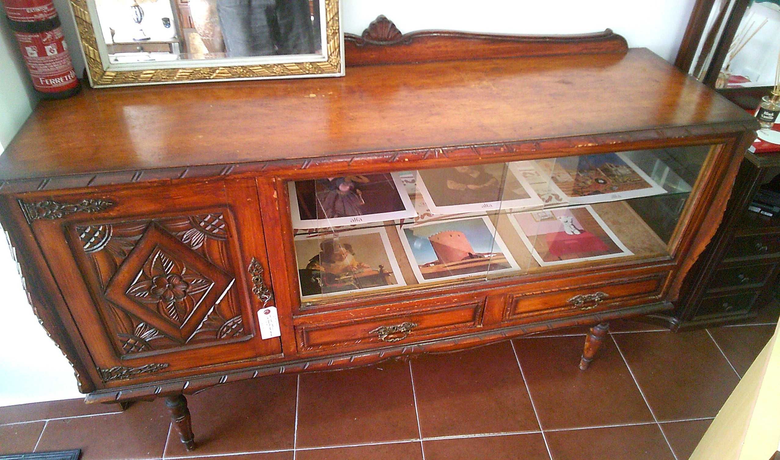 Elegant antique credenza—beautiful carvings and different wood shades