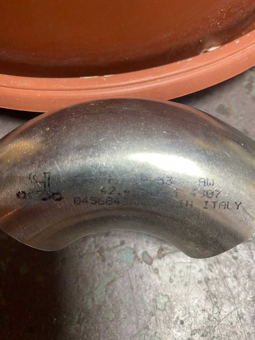 Відвід (отвод, коліно) із нержавіючої сталі. Італія.