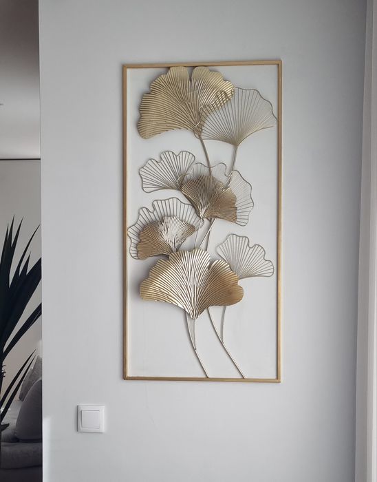 Quadro em metal dourado