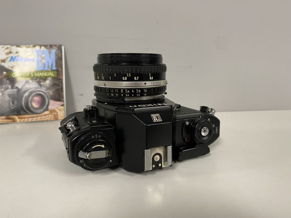 Nikon EM 50mm f1.8 ,75-210mm f3.5-4.5 - aparat analogowy, super stan