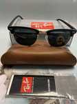 Ray-Ban sunglasses.
