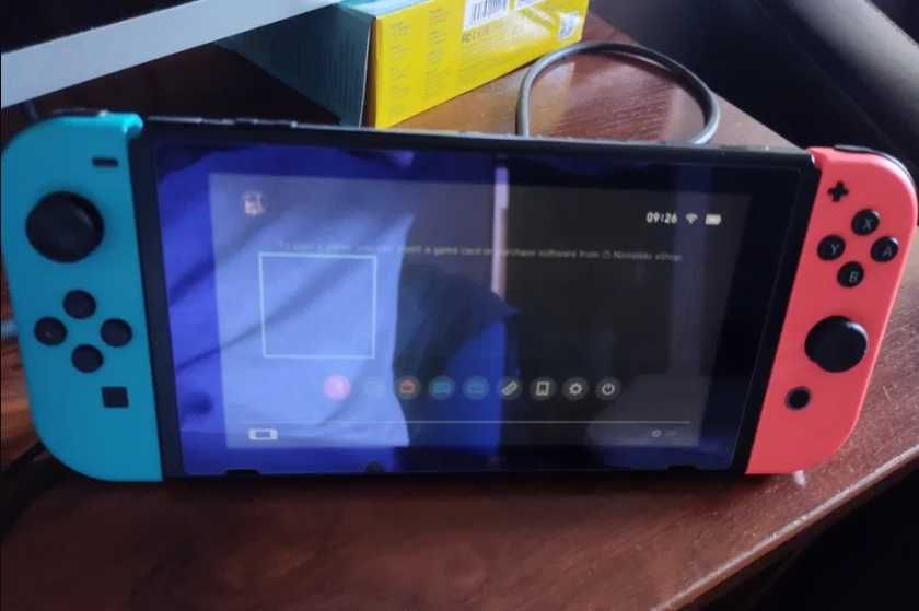 Nintendo Switch  com comandos e dock