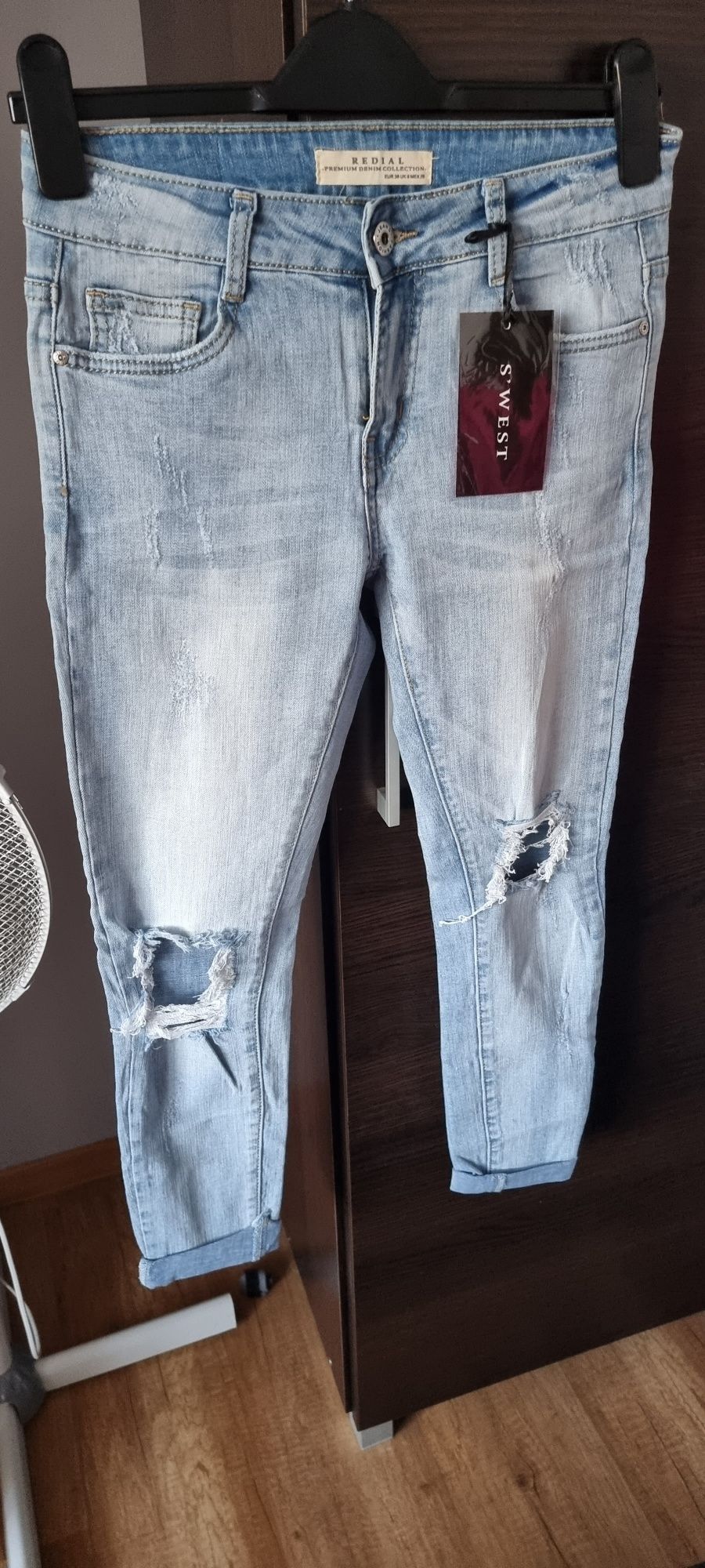 Spodnie jeansowe  nowe SM