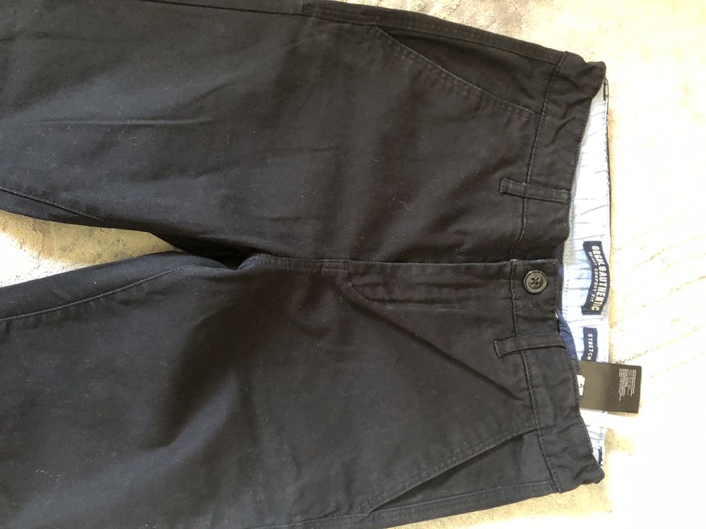 Spodnie bawełniane slim H and M 152