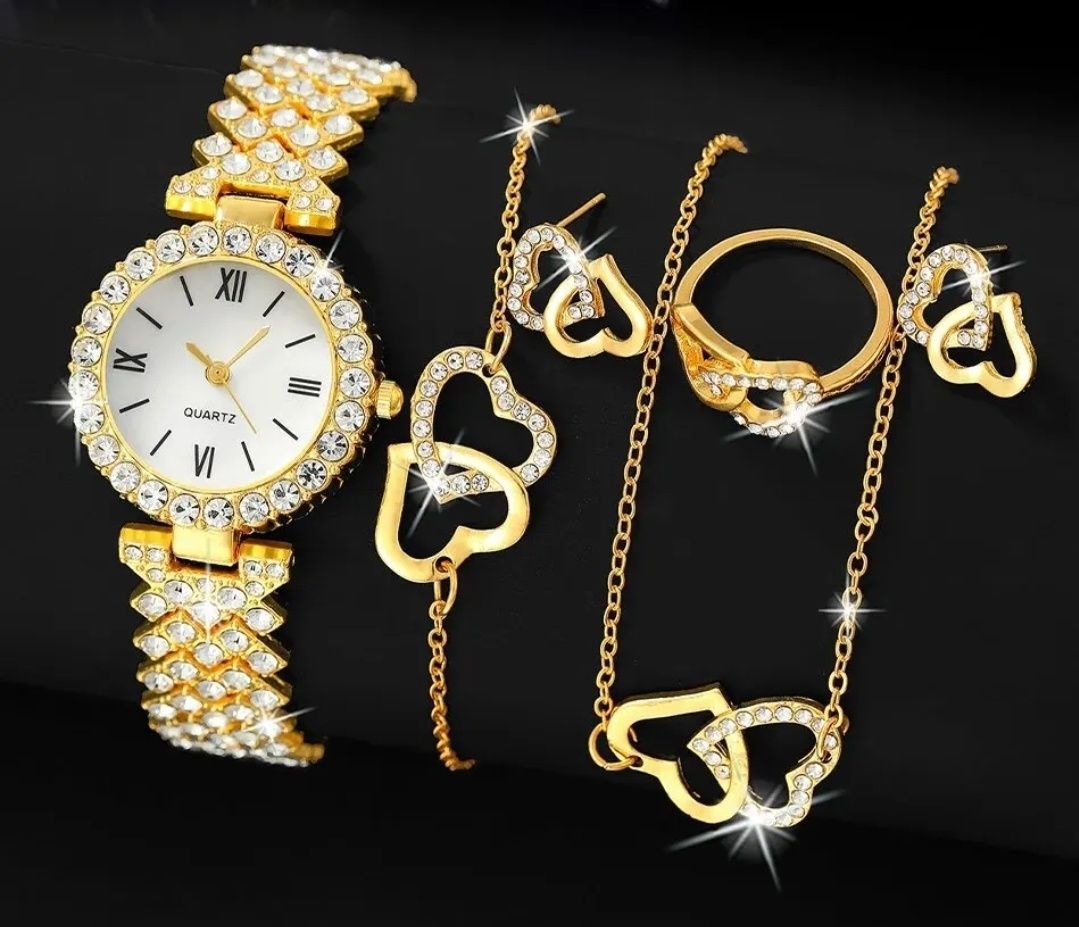 Zegarek kwarcowy damski że złotą bransoletką + biżuteria...  NOWE