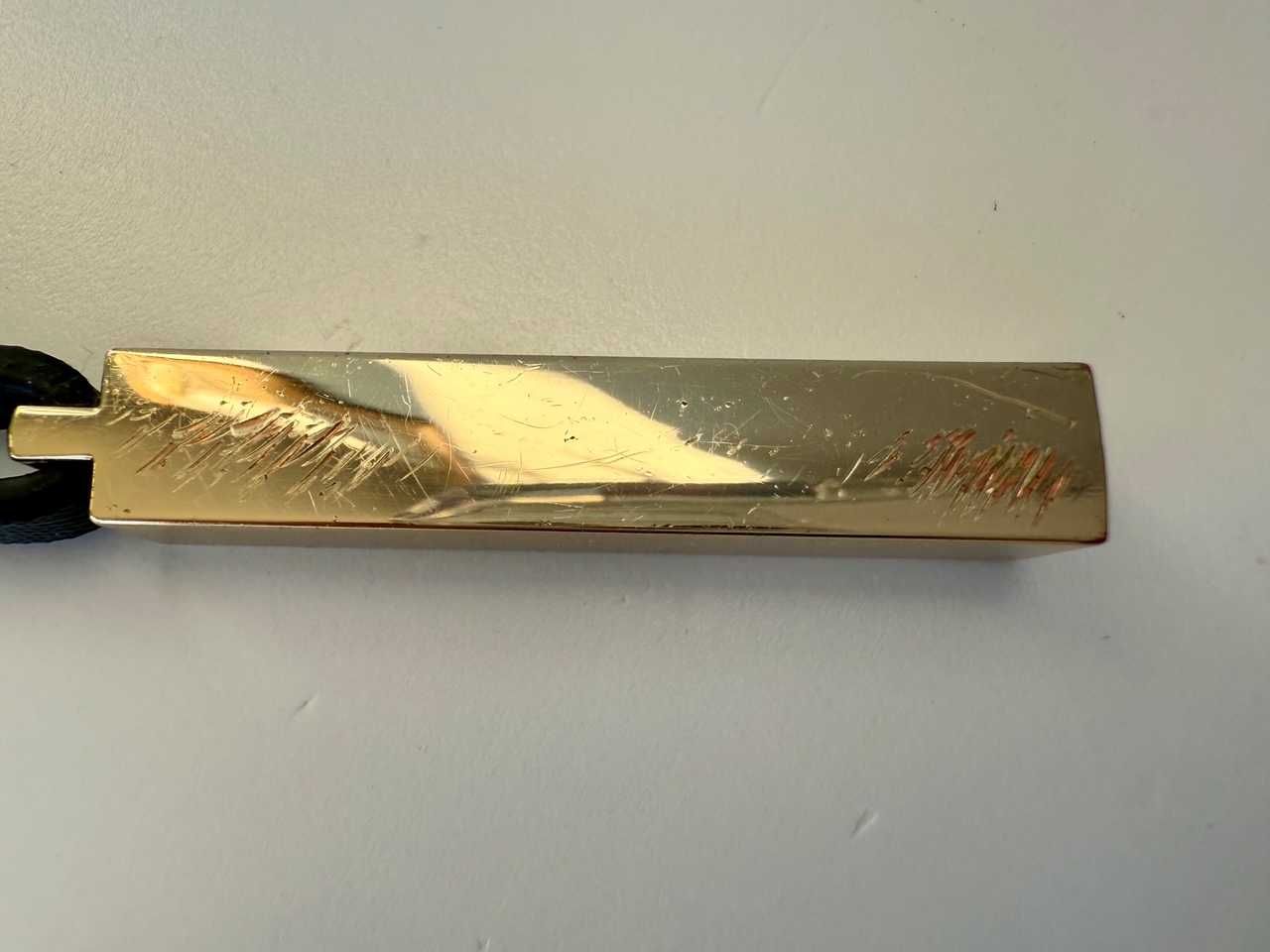 Metalowy, złoty breloczek, zawieszka, Tommy Hilfiger
