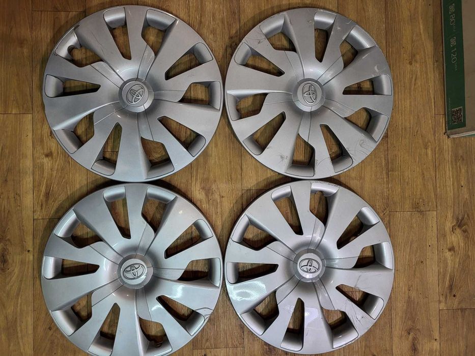 Ковпаки на диски , 4шт., Toyota Yaris (2014-16) , R15 , оригінал ,