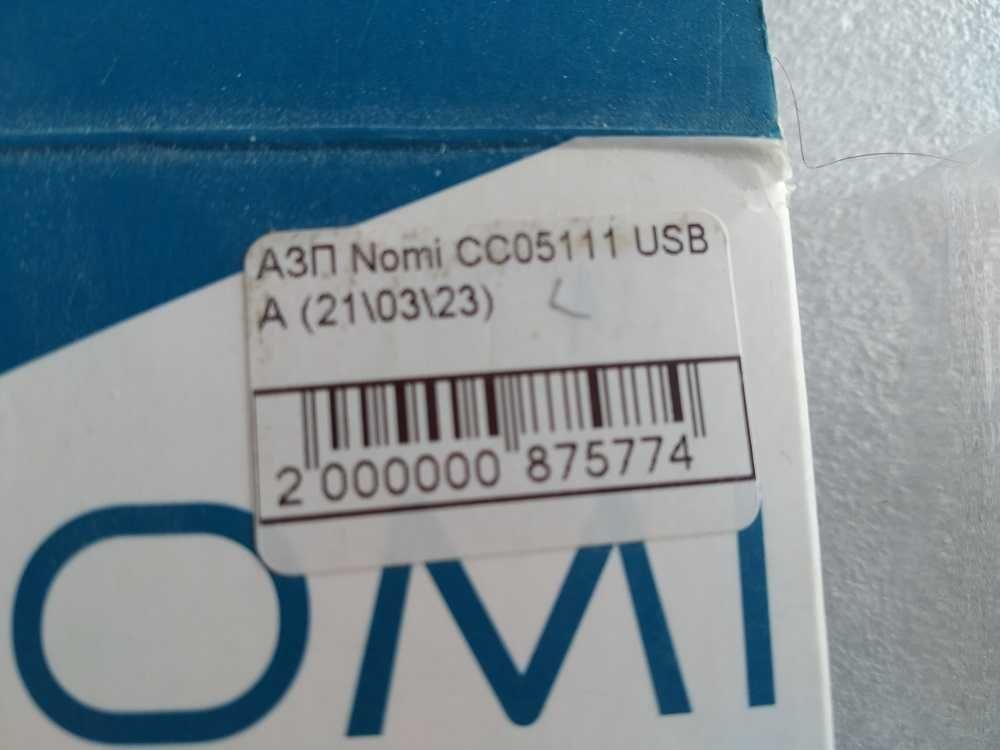 Нова автомобільна зарядка для телефона MicroUSB Nomi CC05111