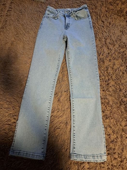 Джинси жіночі з розрізом по боках знизу