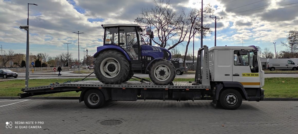 Pomoc drogowa Michòw laweta transport usługi holowanie 24h